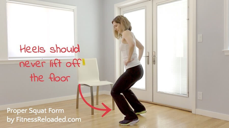 proper squat form Heels should never lift off the floor